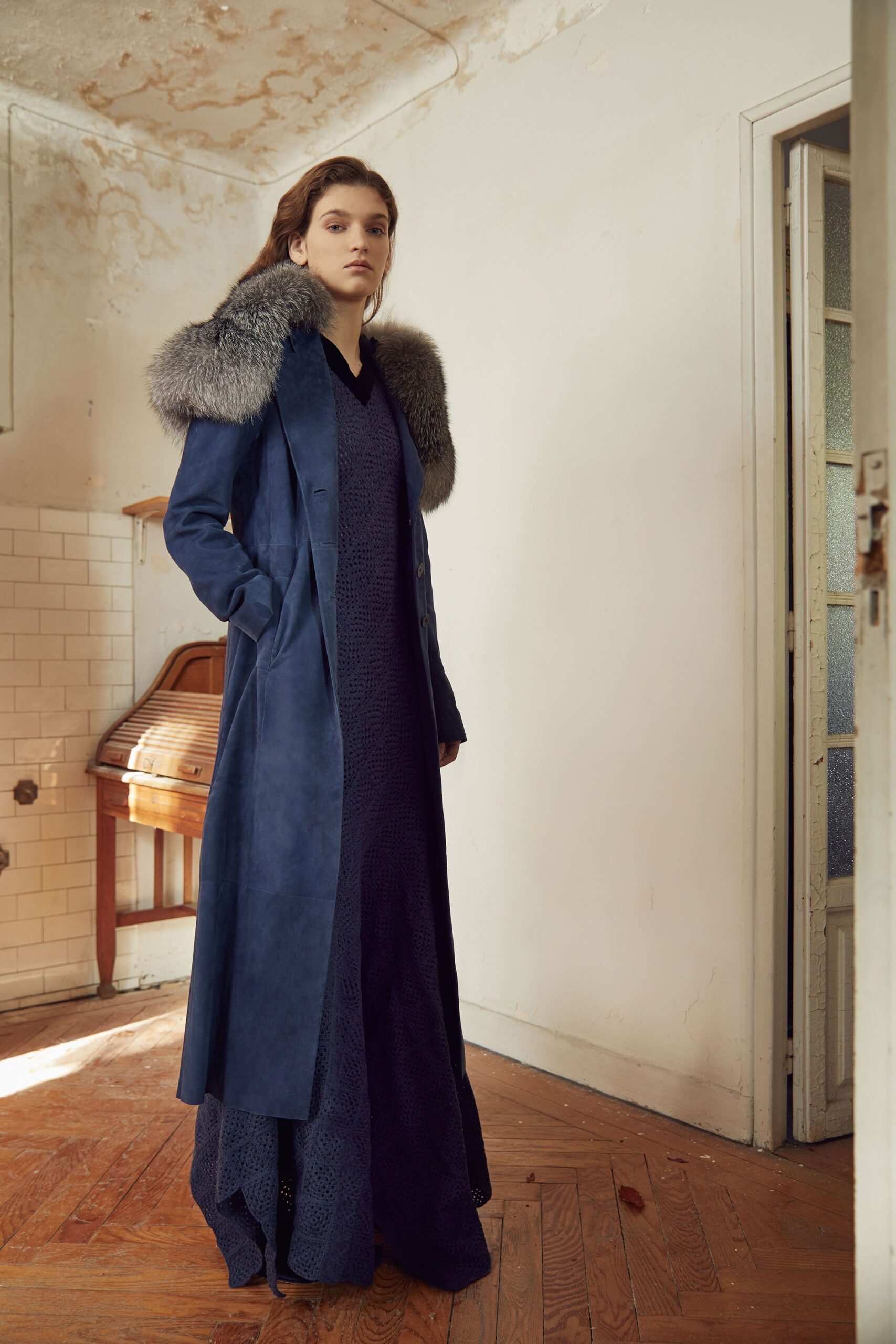 blue suede coat and lace gown