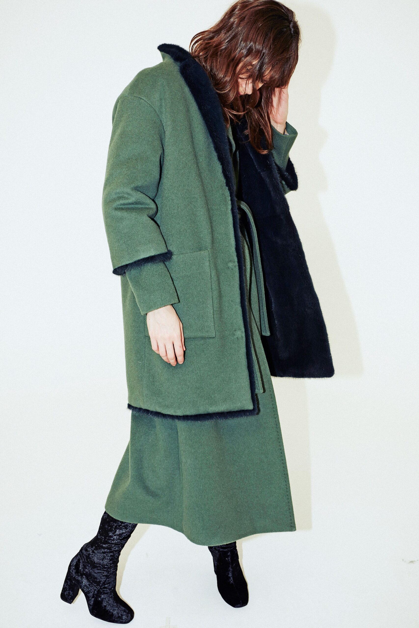 green wool coat and dress
