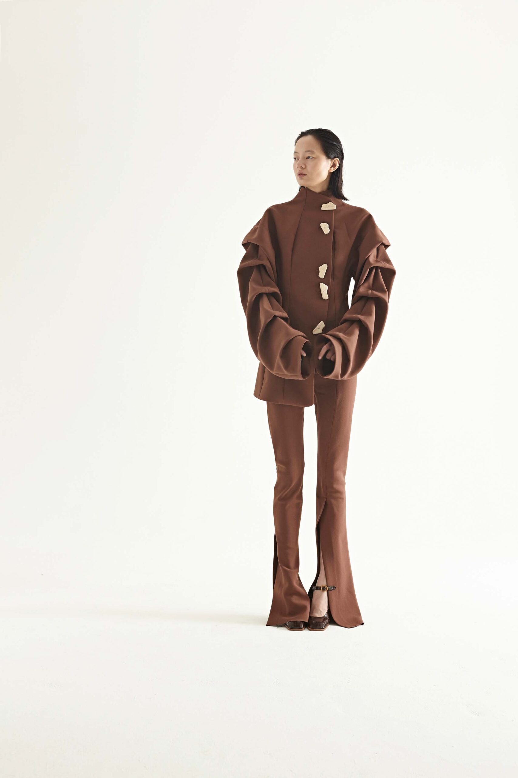 brown fitted jacket and pants
