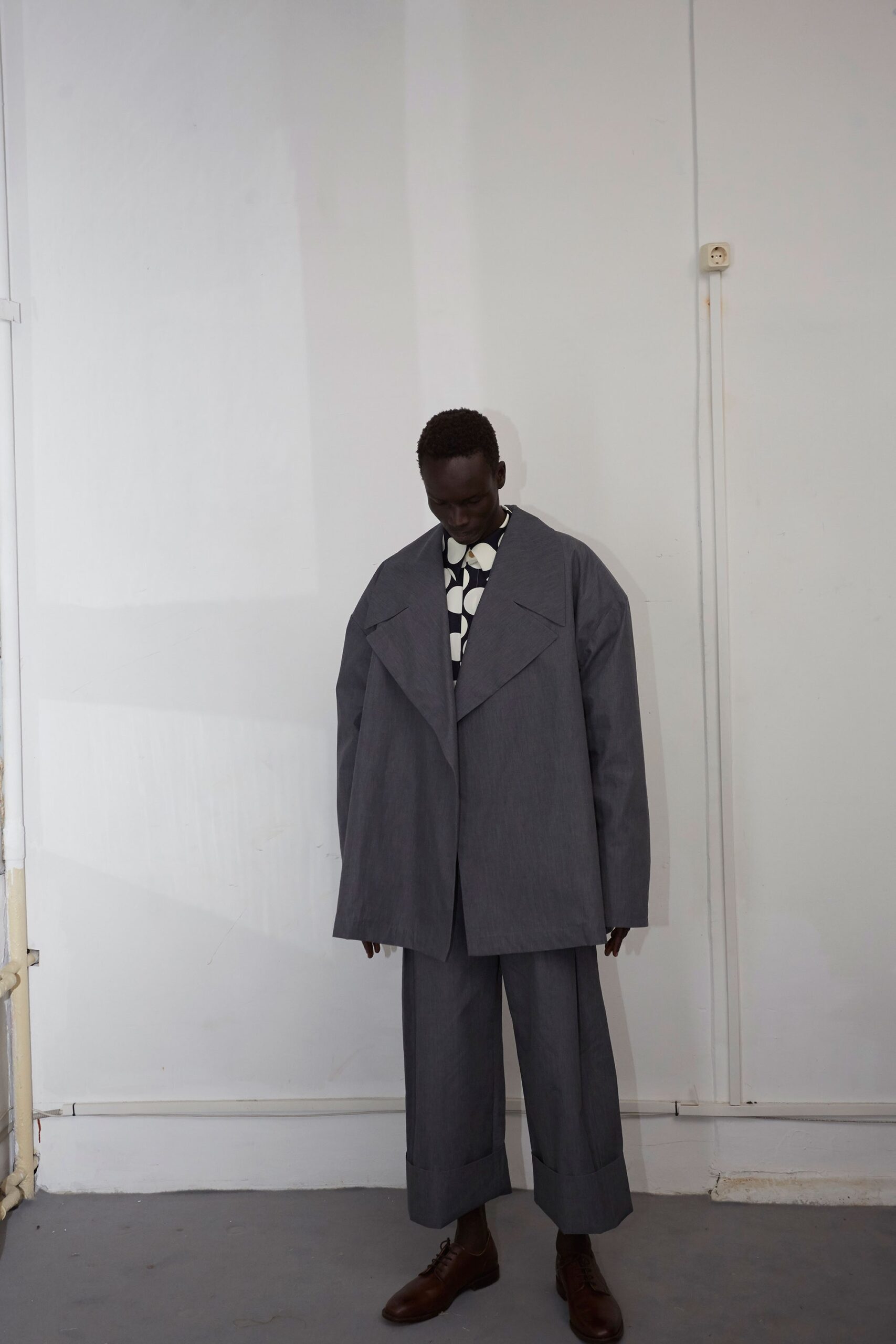 oversized gray jacket and relaxed pants