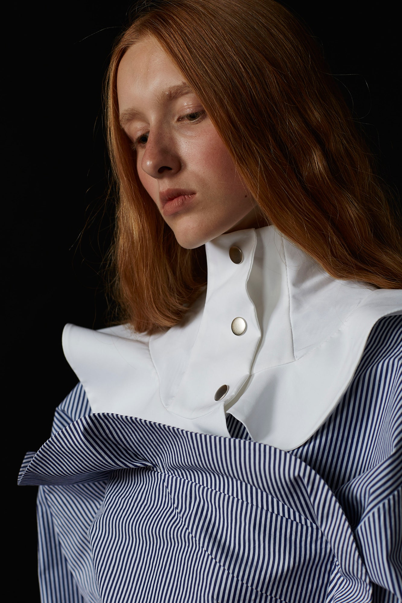 white and blue pleated blouse
