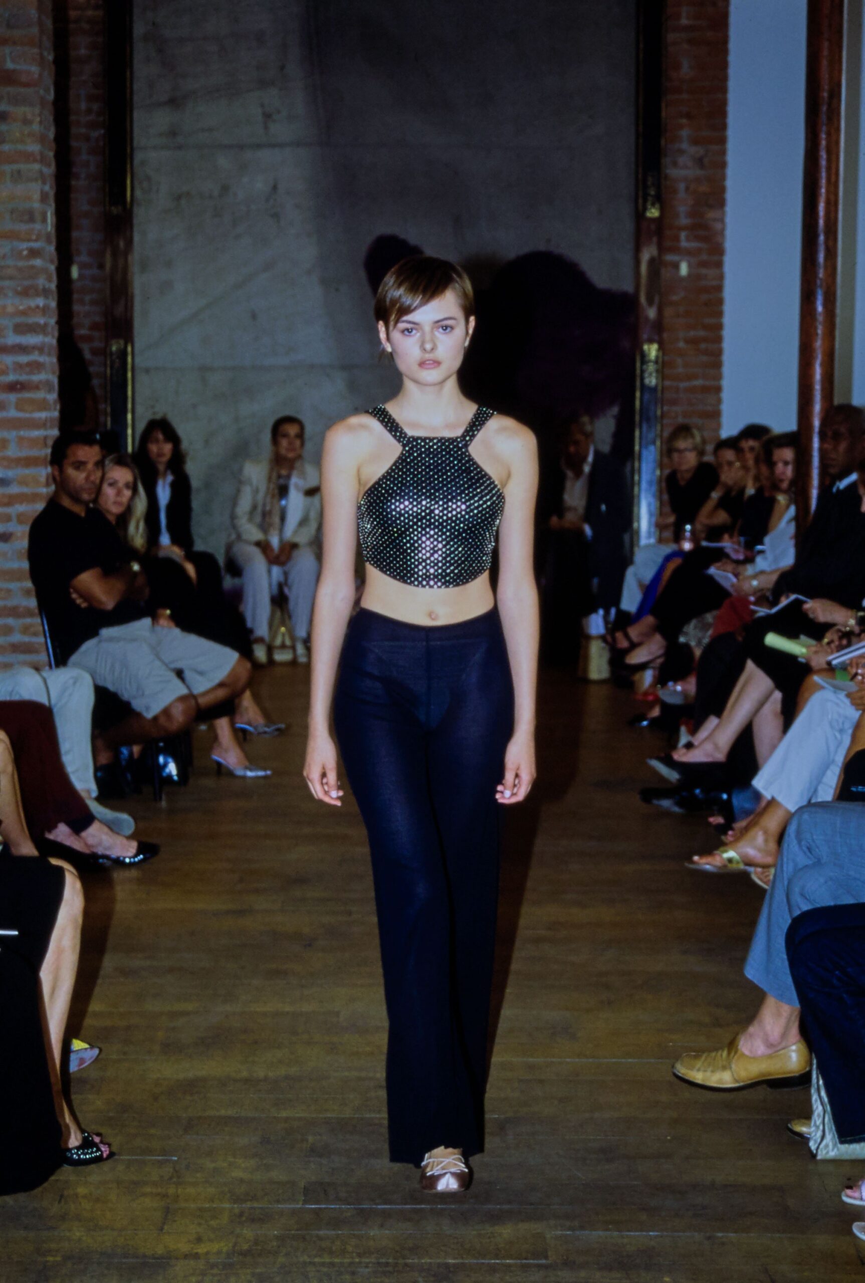 black beaded crop-top and fitted pants