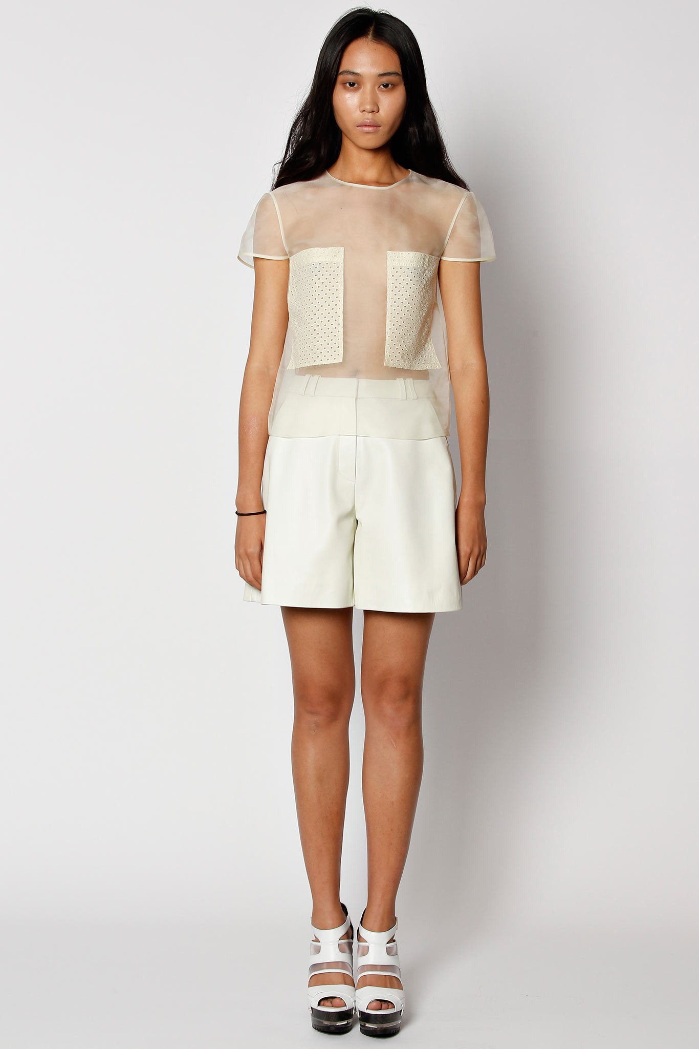 beige mesh top with white shorts