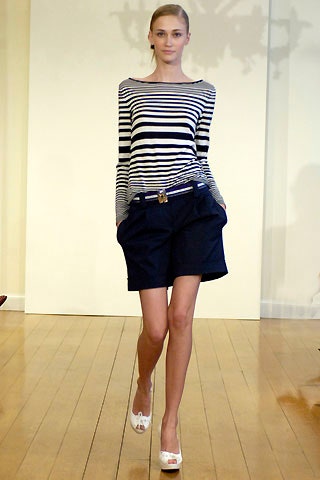 striped top and navy shorts