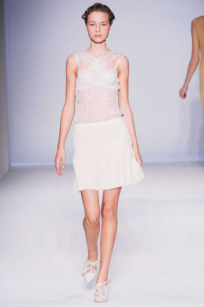 white sheer top and mini skirt