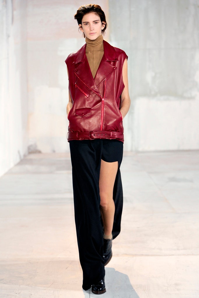 red leather sleeveless vest with black pants