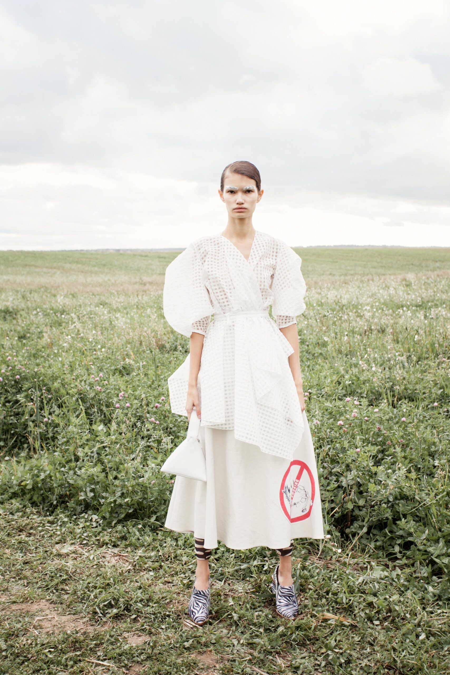 white relaxed midi dress with bag
