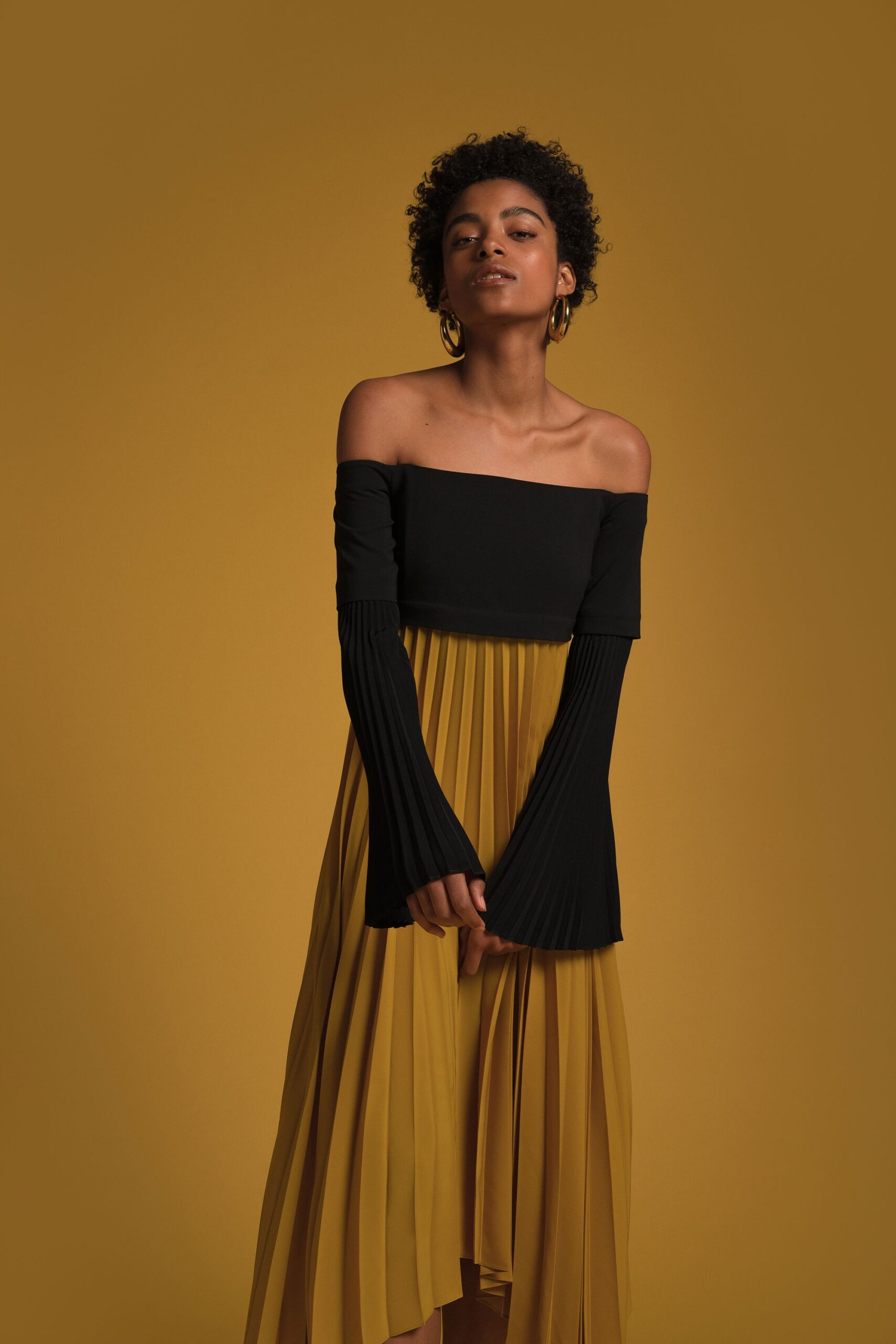 black and yellow off-shoulder dress