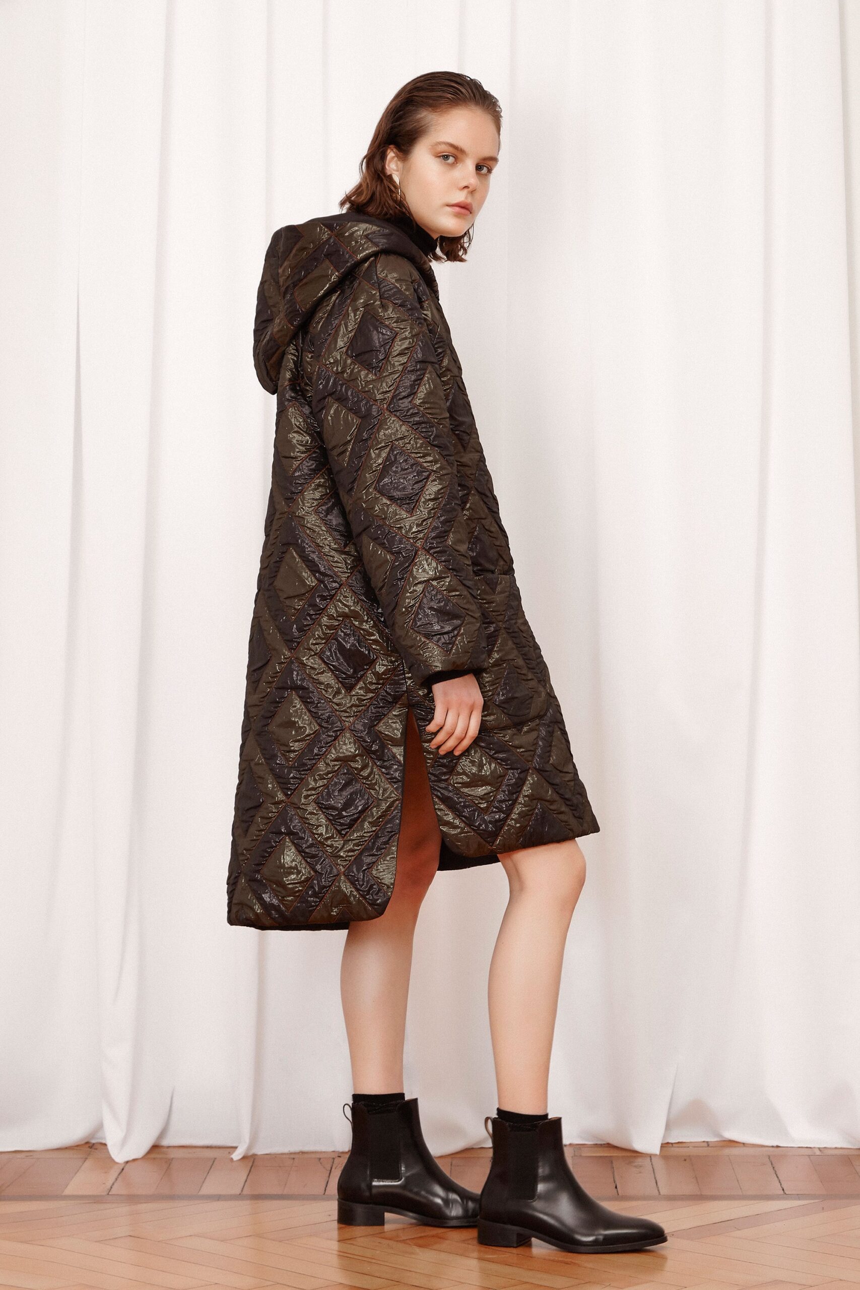 black vinyl long-sleeve hooded relaxed quilted shiny coat