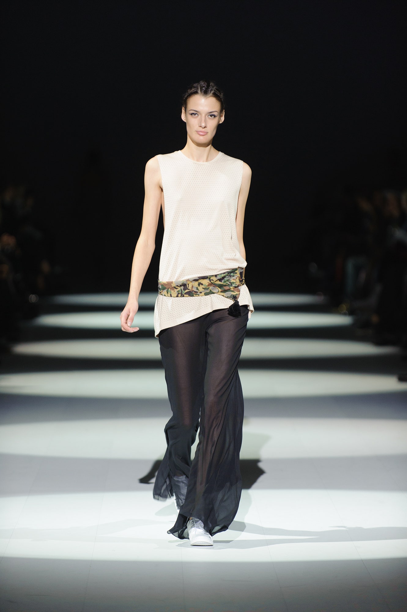 beige relaxed top with black pants