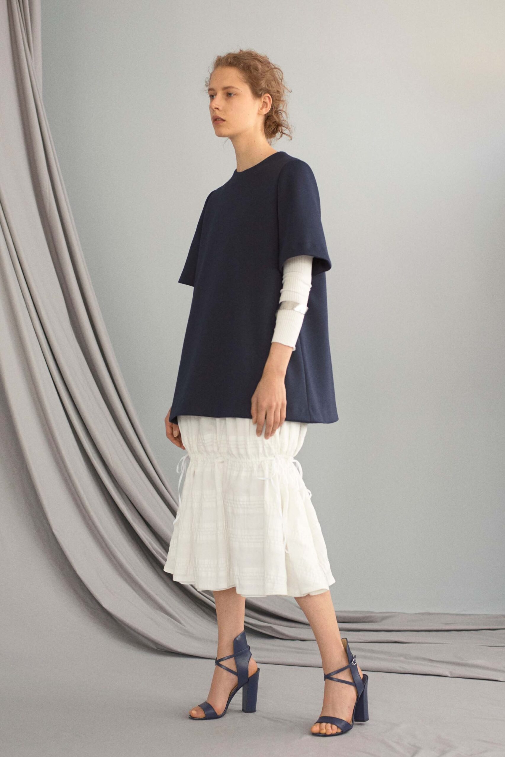 blue oversized top white tiered skirt