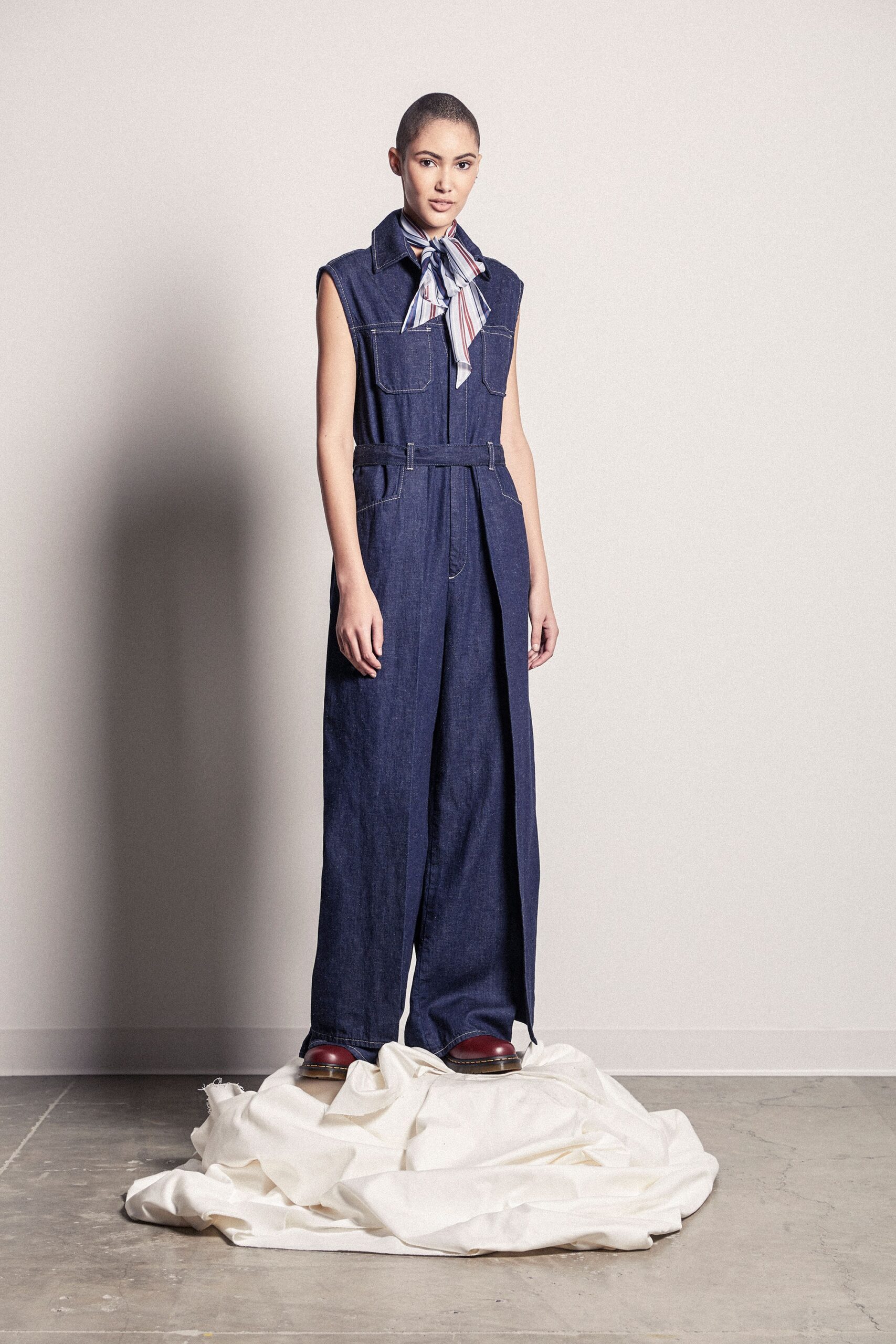 blue denim jumpsuit with scarf