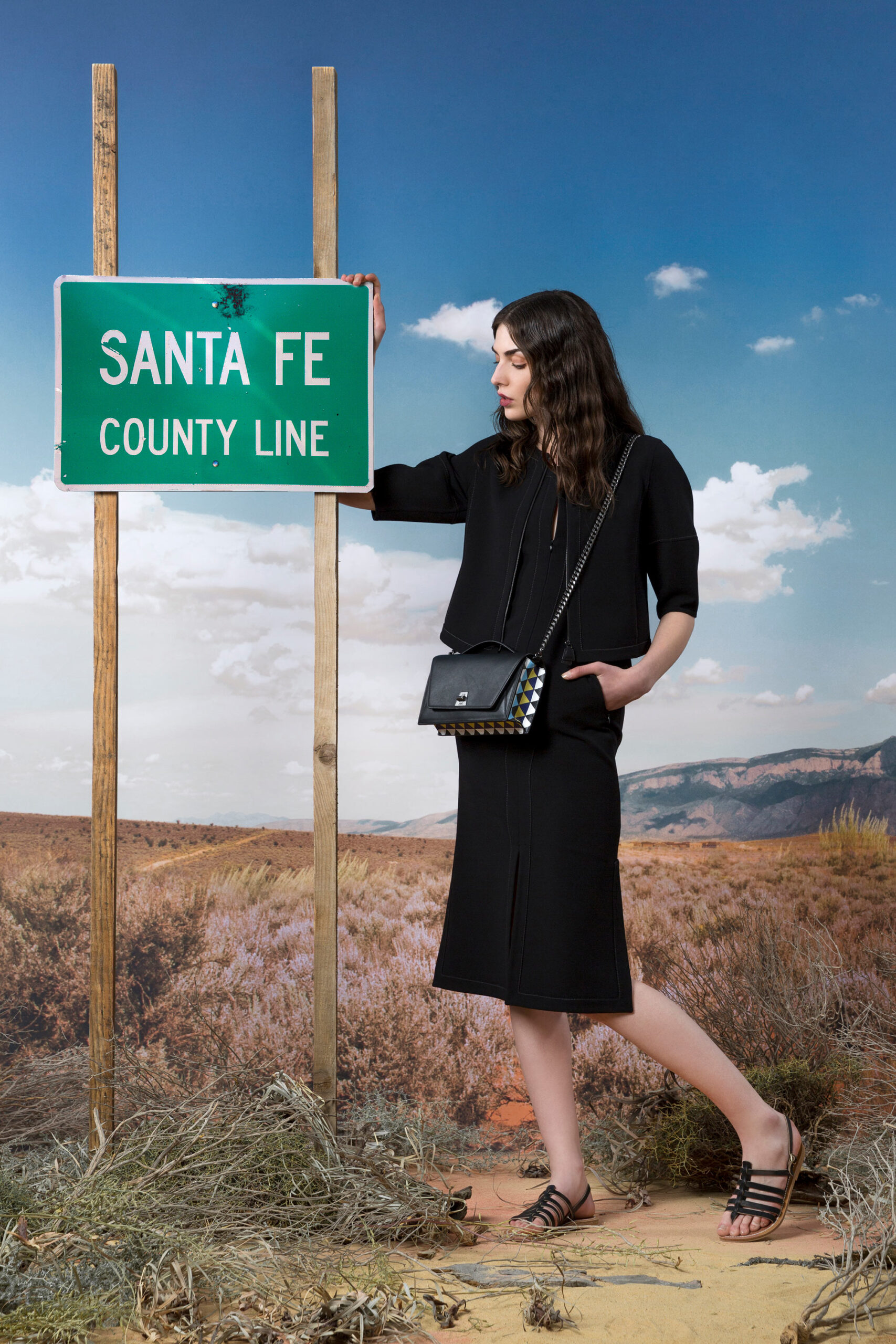 black fitted midi dress