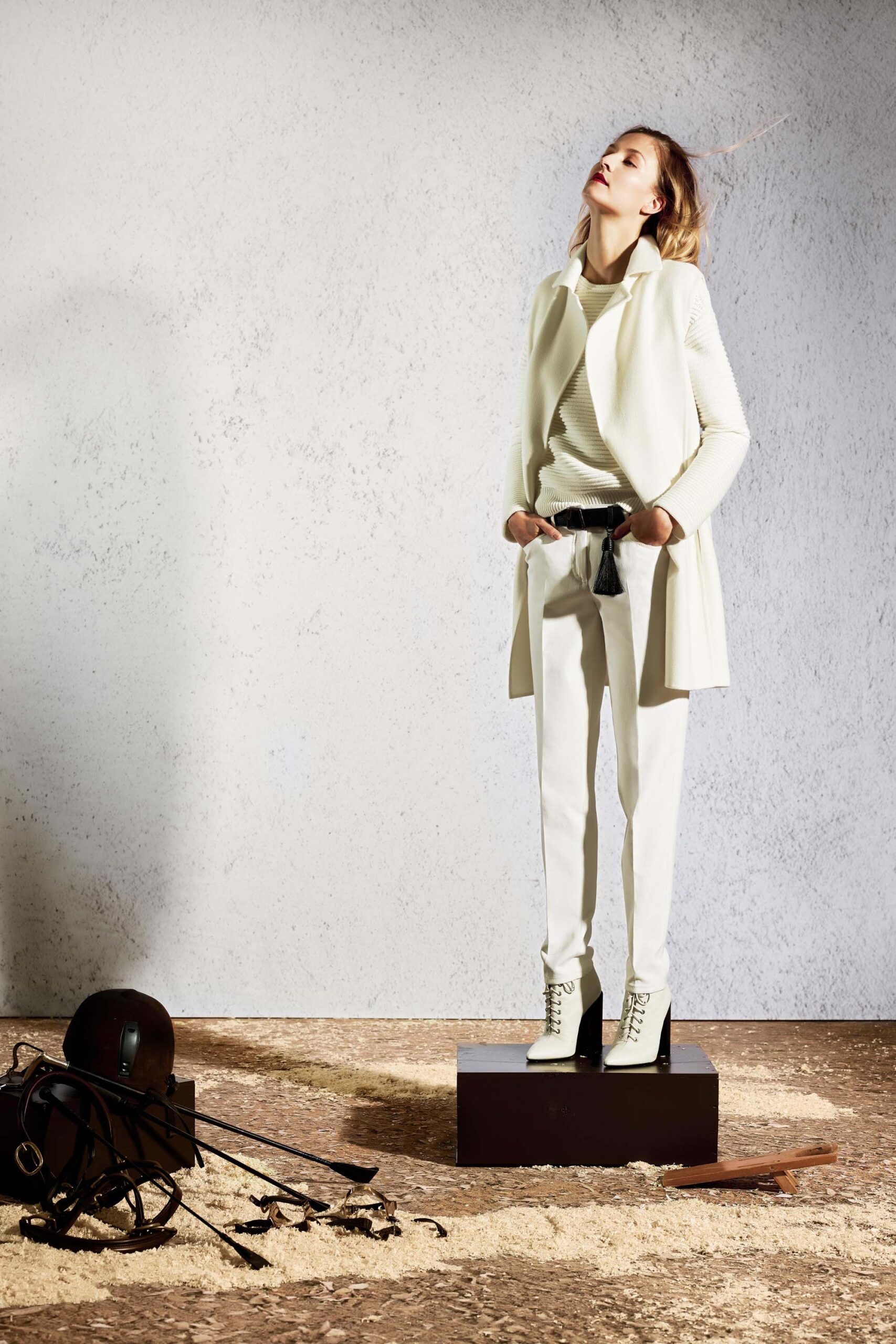 white fitted coat and sweater