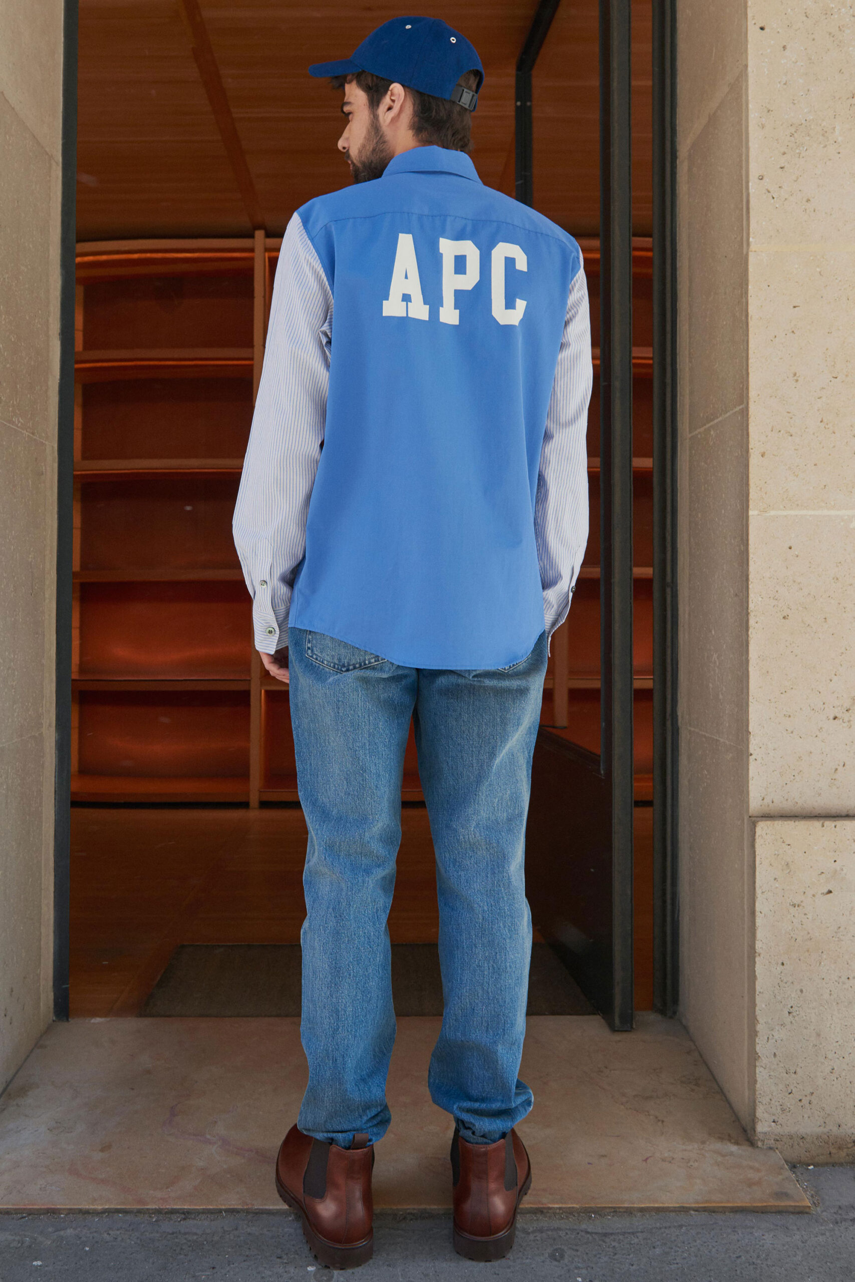 blue shirt and denim pants