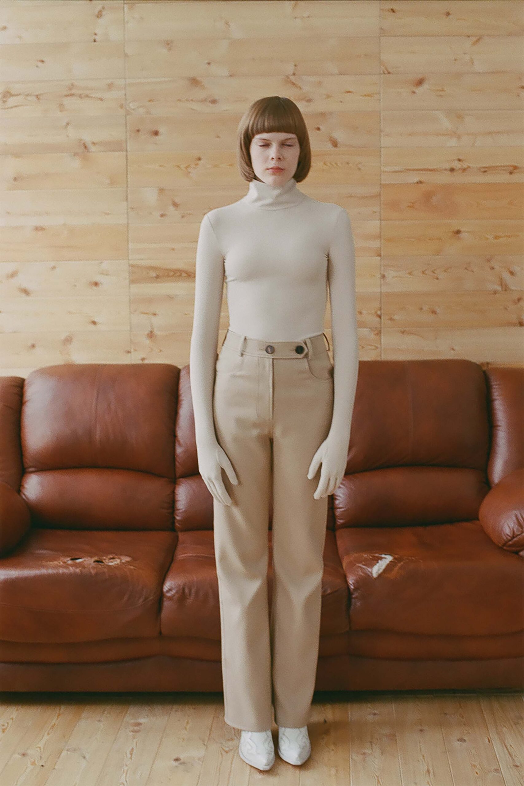beige fitted top and tailored pants