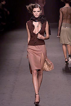 brown silk fitted top and beige skirt