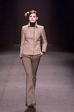 beige tailored blazer and brown flared pants