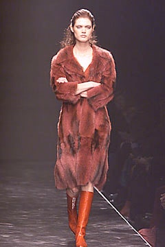 red fur long-sleeve collared relaxed layered midi coat