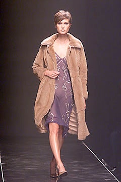 brown faux-fur coat with purple dress
