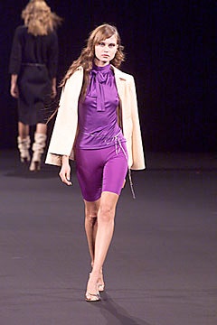 fitted purple dress with white jacket