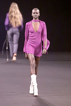 fitted purple mini dress with flared sleeves