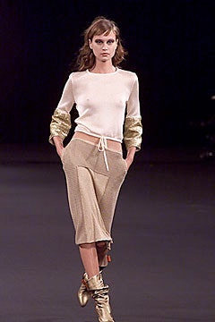 white silk top with gold skirt