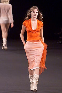 orange silk fitted top with pink skirt