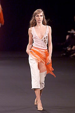 white silk sleeveless top with orange