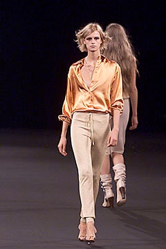 orange silk shirt beige pants