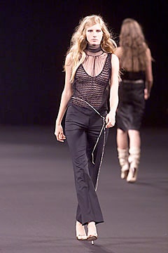 black mesh sleeveless top and slim pants