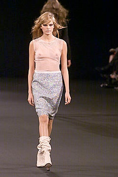 pink sheer top with multi skirt