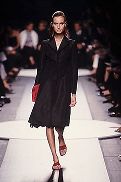 black silk midi dress with red bag
