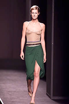 beige halter top and green skirt