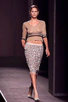 beige fitted cropped top and multi pencil skirt