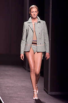 gray tailored jacket with beige swimsuit