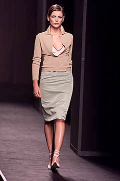 beige fitted top with green midi skirt