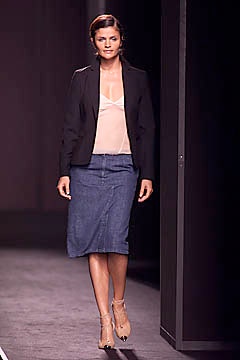 black blazer beige top blue skirt
