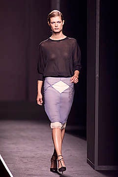 black sheer top and blue pencil skirt