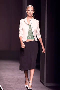 beige fitted jacket with green top