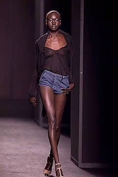 black silk sleeveless top and blue denim shorts