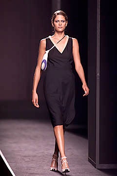 black fitted midi dress with bag