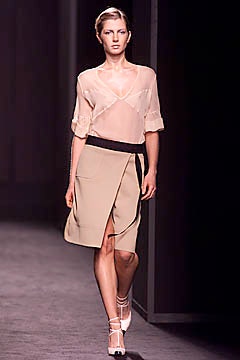 beige silk sheer blouse with black skirt