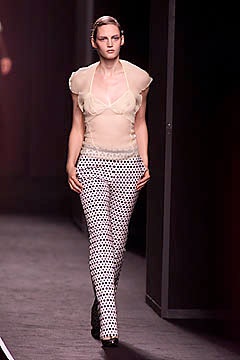 sheer white top with black pants