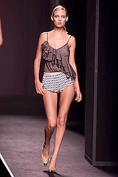 black and white ruffled top with polka-dot shorts