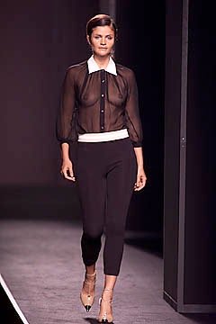 black sheer blouse with cropped pants