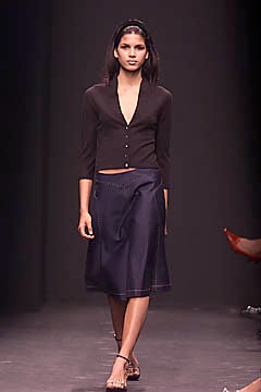 black fitted top with blue skirt