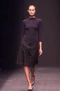 black fitted top and midi skirt