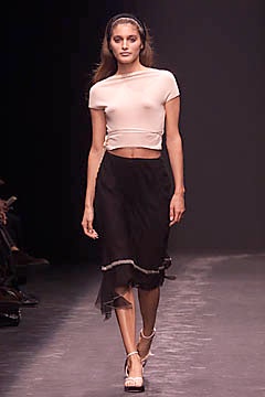white fitted top and black skirt