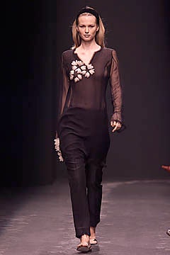 black sheer top and fitted pants